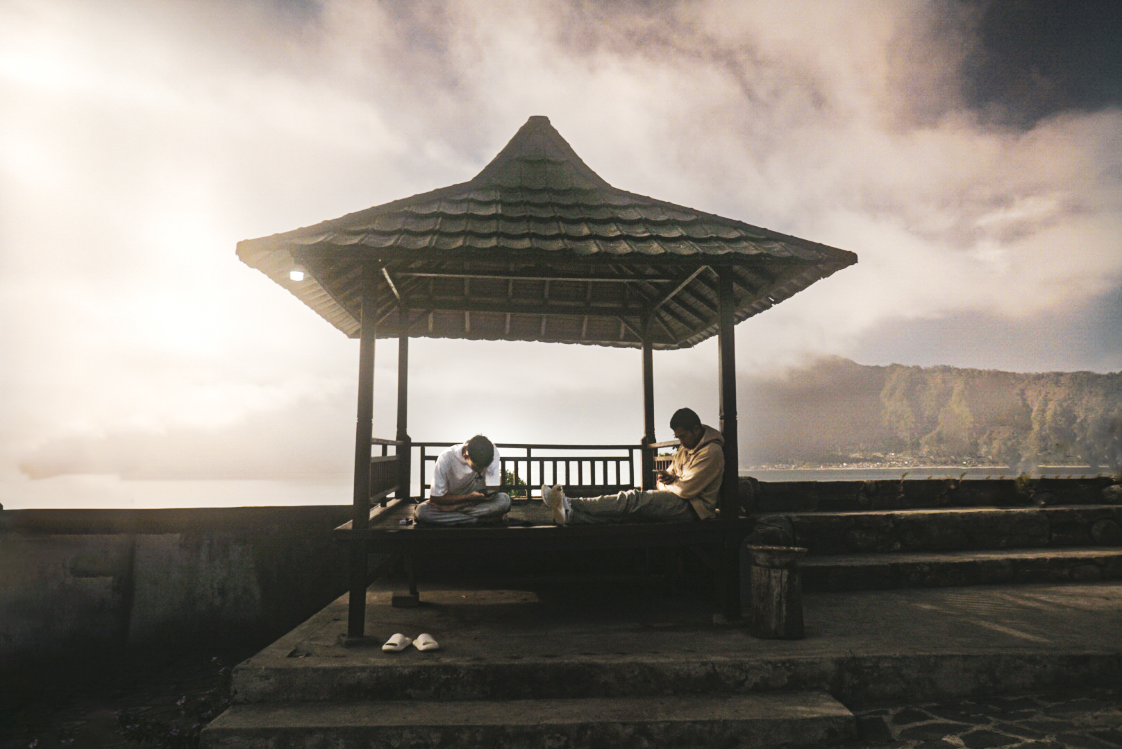 People relaxing in gazebo