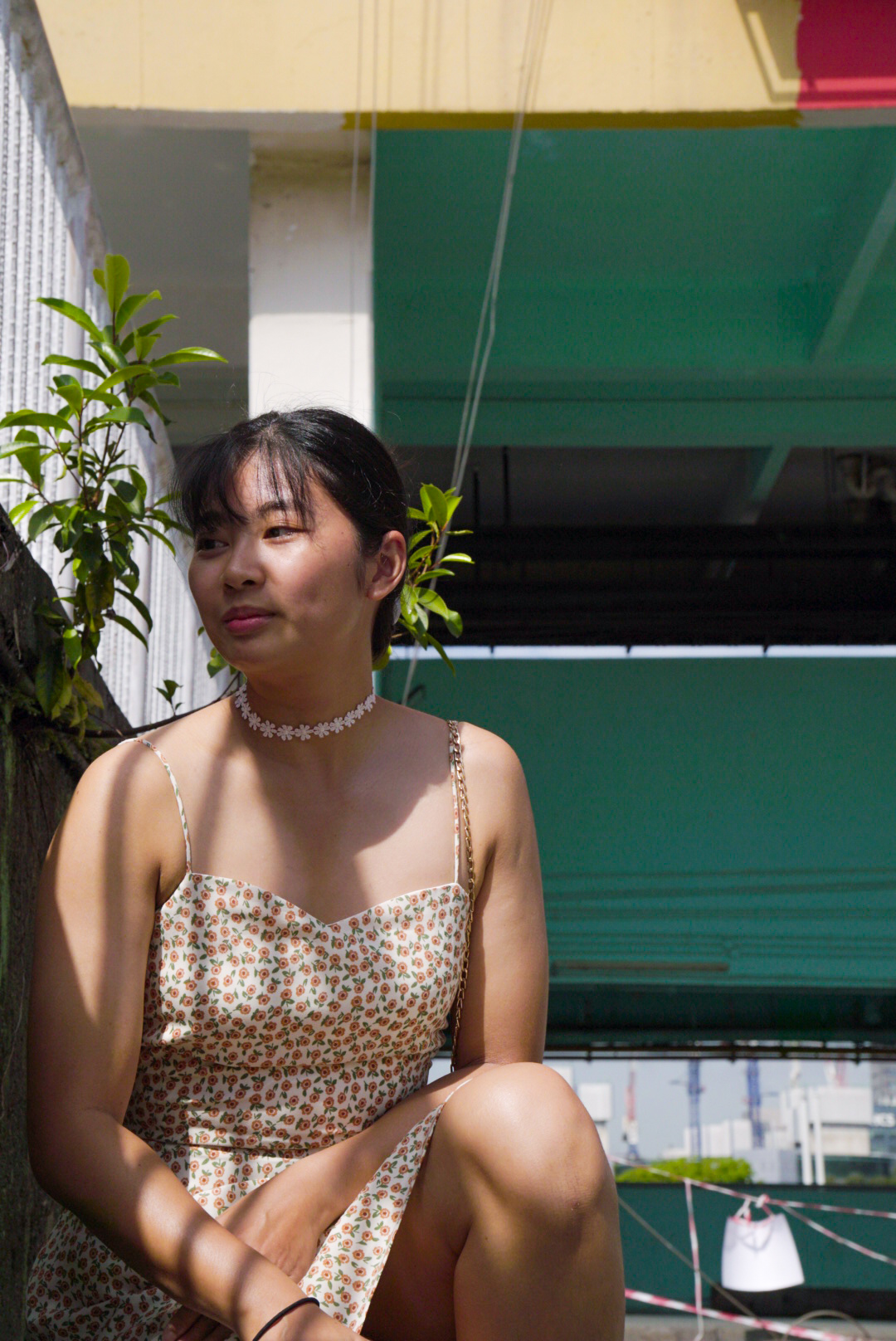 Woman closeup with building