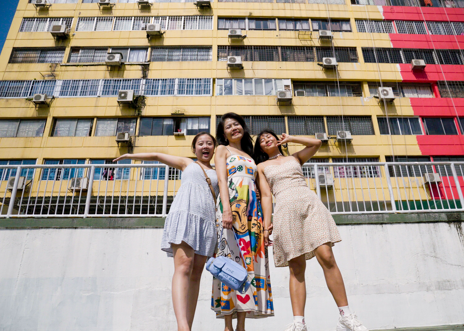 Woman in front of building 1